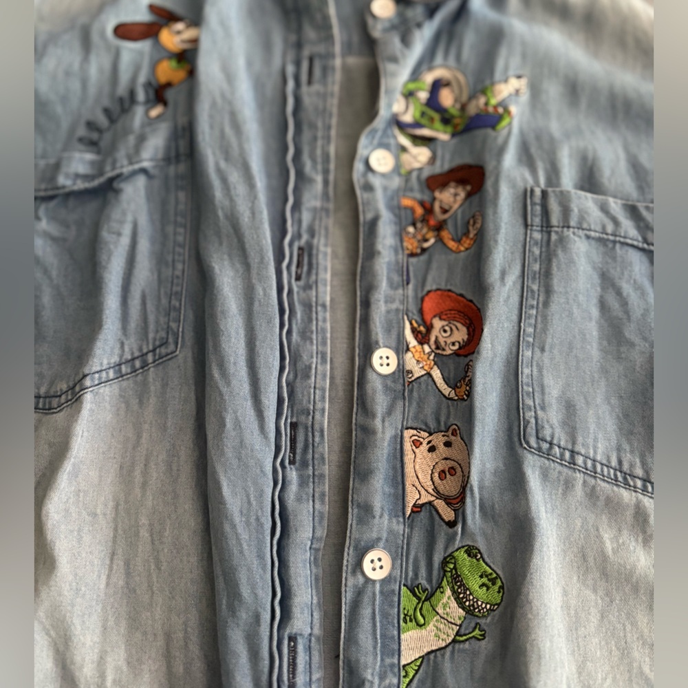 TORRID size 3 Toy Story denim button up.